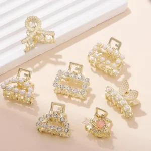 This image displays a set of seven gold metal hair clips accented with pearls, designed for women's hair styling and fashion.