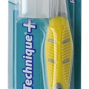 Gum Technique Pro toothbrush with angled bristles and quad-grip handle for effective plaque removal and healthier gums.