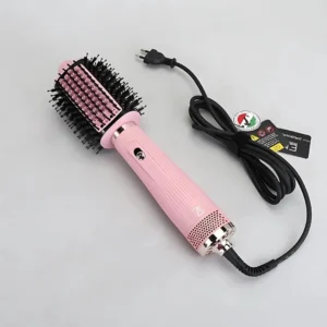 Pink 4-in-1 hair dryer brush with ionic technology for drying, straightening, volumizing and styling hair, featuring a lightweight and ergonomic design.