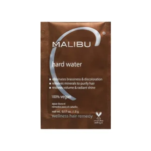 Malibu C Hard Water Wellness Hair Remedy removes hard water deposits and impurities, eliminating brassiness and discoloration for healthier, shinier, and more vibrant hair.