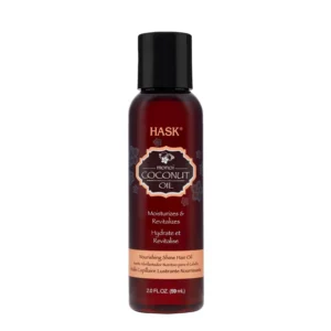 Bottle of Hask Coconut Oil Nourishing Shine Hair Oil, a paraben-free and sulfate-free formula for healthy, shiny hair.