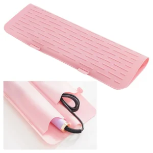 Pink silicone heat resistant mat pouch for hair tools, designed for travel and organizing curling irons, hair straighteners, and other hot styling tools.