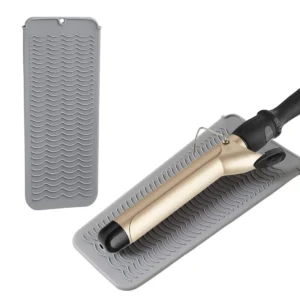 This heat resistant mat and pouch combo protects surfaces from hot styling tools and provides a safe way to store your flat iron, curling iron or hair straightener while traveling.