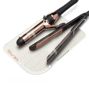 This heat resistant silicone mat protects your vanity countertop from hot styling tools, such as curling irons and flat irons, and it's perfect for organizing your hair accessories.