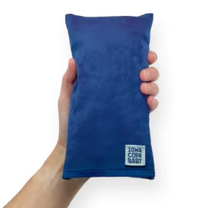 Oasis blue microwavable heating pad filled with corn, perfect for moist heat therapy on sore necks, achy wrists, or as a cold pack.