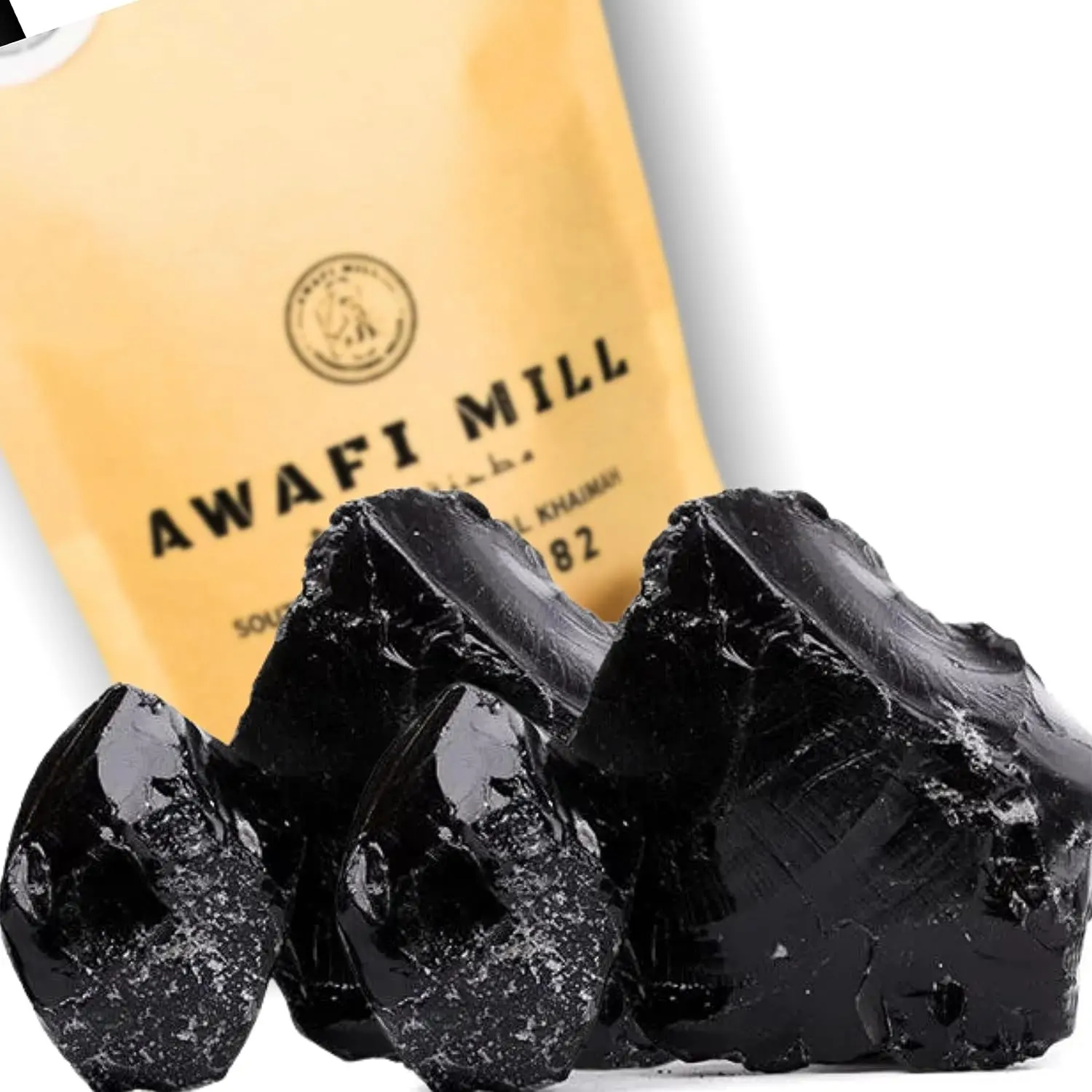 Dark brown Himalayan Shilajit resin chunks from Awafi Mill, ready to dissolve in warm water for a natural mineral supplement.