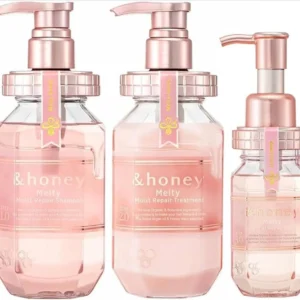 &honey Melty Moist Repair shampoo, treatment, and hair oil set with argan oil in rose gold packaging.