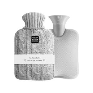 This hot water bottle with a knitted cover can be used as a reusable heat or cold pack for pain relief, warming, and refreezing, making it ideal for hot or cold therapy.