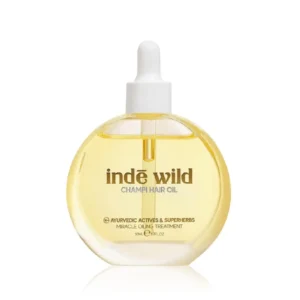 inde wild hair oil infused with Ayurvedic ingredients like Bhringraj, Brahmi, and Amla to strengthen hair, soothe the scalp, and promote healthy growth.