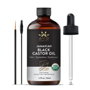 A bottle of AVD Organics Jamaican Black Castor Oil with dropper, ideal for promoting hair growth, moisturizing skin, and enhancing eyelashes and eyebrows.