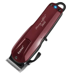 The KEMEI professional hair clipper set includes a durable carbon steel blade, adjustable head, four attachment combs and is perfect for barbers and family use.