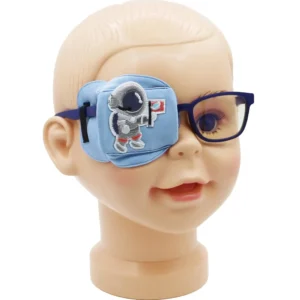 Blue astronaut Astropic 3D silk eye patch for kids with lazy eye, designed to fit comfortably over glasses and provide complete blackout protection for effective patching treatment.