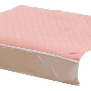 Pink Kylie bed pad with wings and tuck-in flaps providing waterproof and absorbent protection for day or night use.