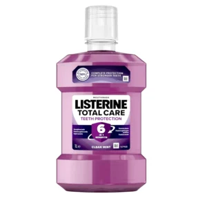 Bottle of Listerine Total Care Clean Mint mouthwash providing 10-in-1 benefits, killing 97% of germs, and offering 12-hour protection.