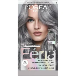 A box of L'Oréal Paris Feria S1 Smokey Silver hair dye, a multi-faceted shimmering permanent hair color for a bold, trendy look with intensified, brilliant results and 3X highlights.