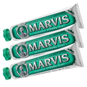 Three tubes of Marvis Classic Strong Mint Toothpaste, a highly effective dental care product formulated with care to keep your teeth strong.