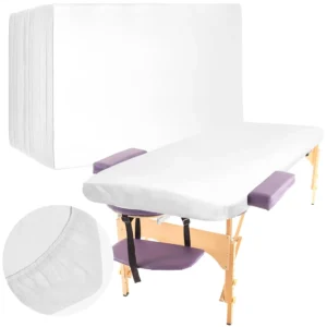 Fifty disposable fitted massage table sheets made of waterproof non-woven fabric for spa, salon, lash, facial bed, hotel, or travel use, each measuring 39.4 x 86.6 inches.