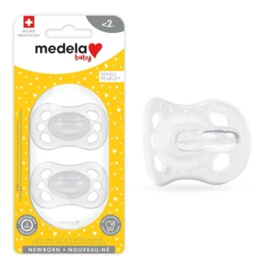 Two clear Medela newborn pacifiers in a sterilizing case, designed for babies 0-2 months with SensoPearls for airflow and an ergonomic shape to allow the baby to smell mom’s scent.