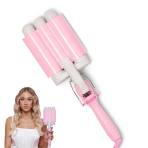The pink Mermade Hair PRO Waver 32mm creates big, bouncy beach waves quickly and safely on all hair types.