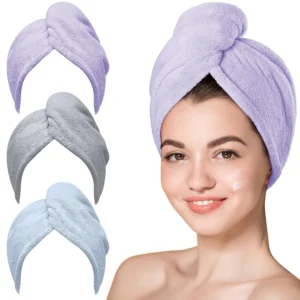 This microfiber hair towel set includes three quick-drying hair turbans in purple, blue, and grey, perfect for gently drying wet, curly, or frizzy hair.