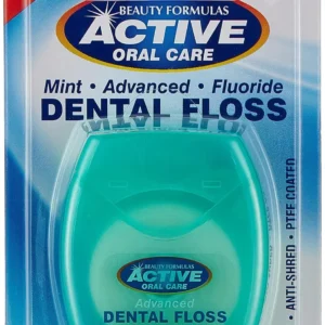 Active oral care mint waxed dental floss with fluoride helps remove plaque and keeps teeth healthy.