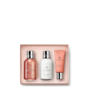 Luxurious Molton Brown Gingerlily gift set featuring bath and shower gel, body lotion, and hand cream with white-floral notes.