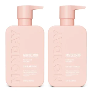MONDAY Moisture shampoo and conditioner set for dry, stressed, coily and curly hair, in 100% recyclable pink bottles, enriched with coconut oil, rice protein, shea butter and vitamin E, and certified cruelty-free.