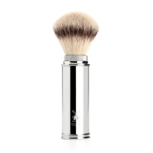 This MÜHLE chrome travel shaving brush features soft silvertip fiber bristles for a luxurious lather on the go.