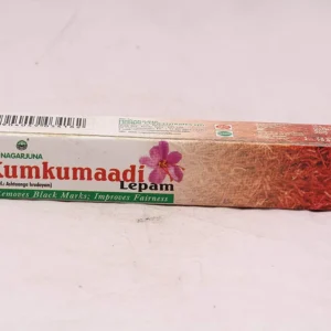 A 10g pack of Nagarjuna Kumkumadi Lepam, a herbal concentrate known for improving fairness and reducing black marks.