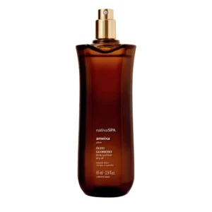 A bottle of Nativa SPA Plum multifunctional body oil by The Boticario for moisturizing skin.