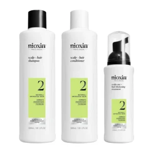 Nioxin System 2 kit cleanses the scalp and removes follicle-clogging sebum, fatty acids, and environmental residue for healthier hair in progressed thinning hair.