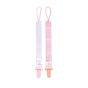 Two Nuby Pacifinder pacifier clips keep baby's pacifier clean, secure, and within reach, featuring a soft fabric loop compatible with most pacifiers and a plastic clip that won't rust.