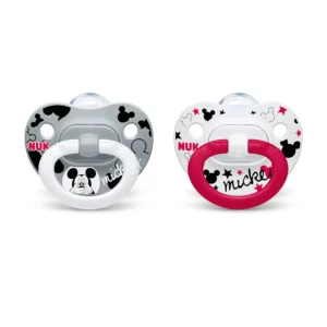 Two NUK Disney Mickey Mouse orthodontic pacifiers for babies ages 6 to 18 months, featuring an asymmetrical shape, heart-shaped shield, and reusable storage case.