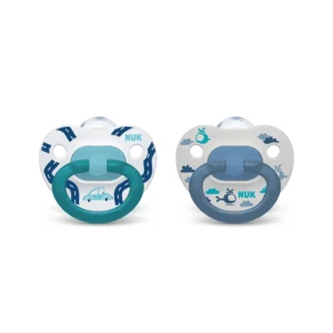 This image shows a two-pack of blue NUK orthodontic pacifiers designed for babies 18-36 months, featuring an asymmetrical shape that promotes healthy oral development and a heart-shaped shield for comfortable breathing.
