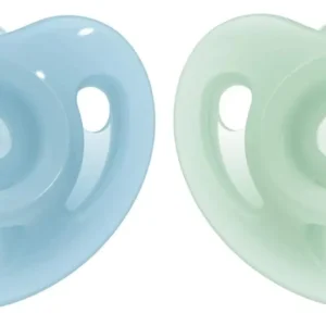 This pack of two NUK sensitive pacifiers in blue and green, designed for babies 0-6 months, features a soft silicone design that's gentle on delicate skin and a breast-like nipple shape for easy acceptance.