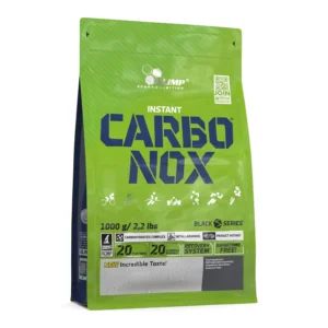 A container of Olimp Carbo Nox orange flavored energy powder, designed to provide fast and sustained energy for workouts and help maintain hydration with electrolytes.