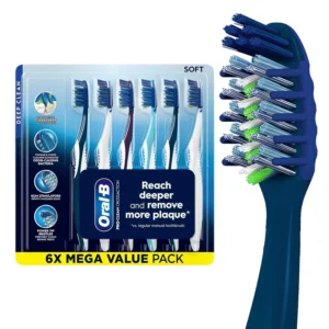 This image displays a pack of six Oral-B CrossAction All In One soft toothbrushes designed for deep plaque removal, featuring cross-action bristles and a tongue and cheek cleaner.