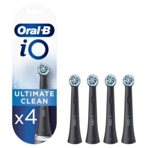Four black Oral-B iO Ultimate Clean replacement brush heads featuring twisted and angled bristles for superior plaque removal with iO technology.