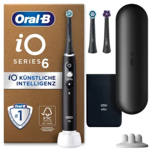 Black Oral-B iO 6 electric toothbrush with magnetic technology, five cleaning modes, display, and three replacement brush heads, packaged in FSC certified cardboard.