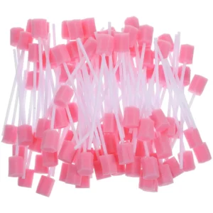 Pink disposable oral care sponge swabs gently clean and moisten sensitive teeth and gums for seniors, adults, and children.