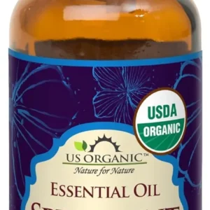 A bottle of US Organic 100% Pure Spearmint Essential Oil, USDA Certified Organic and steam distilled, with a sweet and minty aroma, known for its Vitamin C and nutrients.