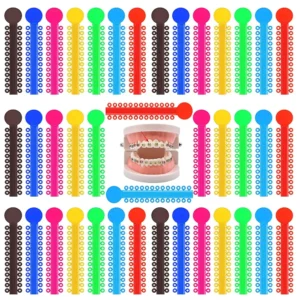 A pack of 1040 multicolor orthodontic ligature ties, 60mm long and 10mm wide, made of hypoallergenic elastic material for braces.