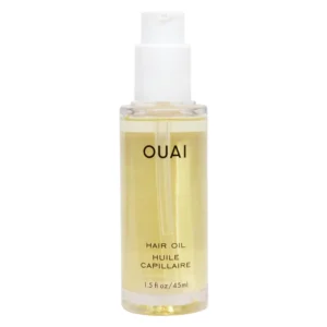 A bottle of OUAI hair oil protects hair from heat up to 450°F, fights frizz, smooths split ends, prevents color fading, and adds a healthy shine.