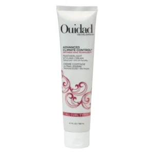 Ouidad Advanced Climate Control Featherlight Styling Cream defines curls with a pillow-soft hold while protecting hair from humidity, heat, UV damage, frizz, and flyaways.