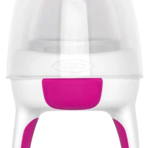 The OXO Tot pink silicone self-feeder allows babies to safely self-feed fresh or frozen food and soothes teething.