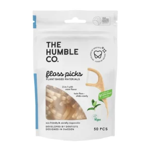A pack of The Humble Co. plant based dental floss picks with fresh mint flavor, an eco-friendly and vegan oral care option.