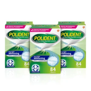 Three boxes of Polident Overnight Whitening Denture Cleaner Tablets, an effervescent cleanser that deep cleans and helps restore dentures to their original color while killing odor-causing bacteria.
