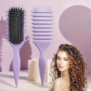 This is a purple hair styling brush with nylon bristles, used to define and style curls.
