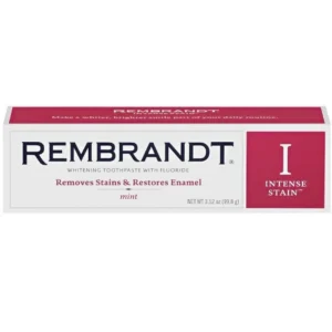Tube of REMBRANDT Intense Stain Whitening Toothpaste with fluoride to remove tough stains and strengthen enamel, offering whiter teeth in 3 days with a refreshing mint flavor.