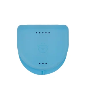 A light blue Dentosmile retainer case with air holes for storing orthodontic retainers, mouth guards, and dentures.